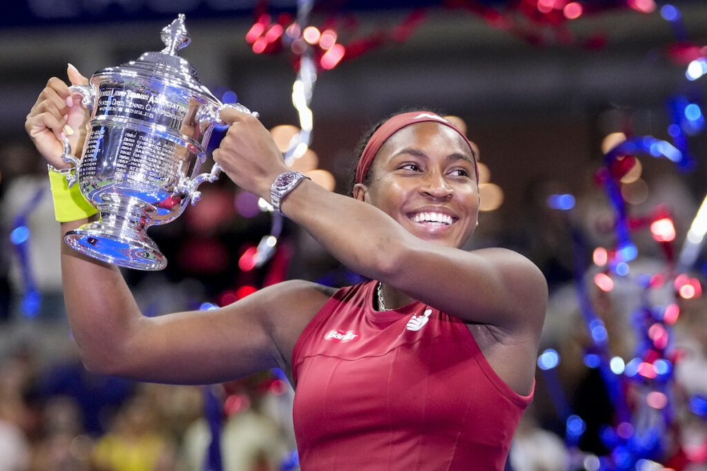 Coco Gauff, of the United States, holds up the championship trophy after defeating Aryna Sabalenka, of Belarus, in the women's singles final of the U.S. Open tennis championships, Saturday, Sept. 9, 2023, in New York.