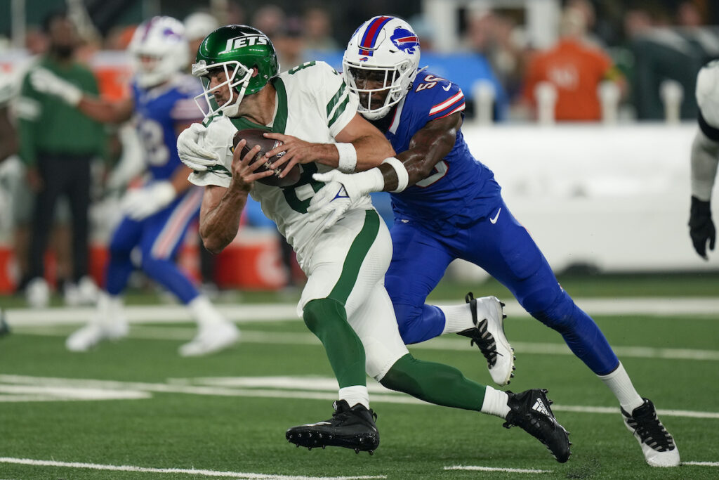 APTOPIX Bills Jets Football New York Jets quarterback Aaron Rodgers (8) is sacked by Buffalo Bills defensive end Leonard Floyd (56) during the first quarter of an NFL football game, Monday, Sept. 11, 2023, in East Rutherford, N.J.