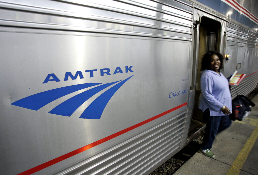 Biden-Rail Projects A passenger disembarks from Amtrak's Sunset Limited at its final stop in New Orleans, Nov. 2, 2008.