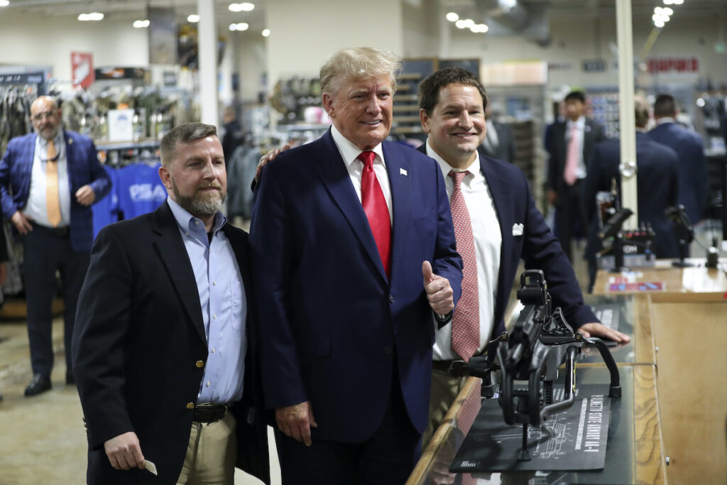 Donald Trump Former President Donald Trump visits the Palmetto State Armory and takes a picture with owners Jamin McCallum and Julian Wilson in Summerville, S.C., Monday, Sept. 25, 2023.