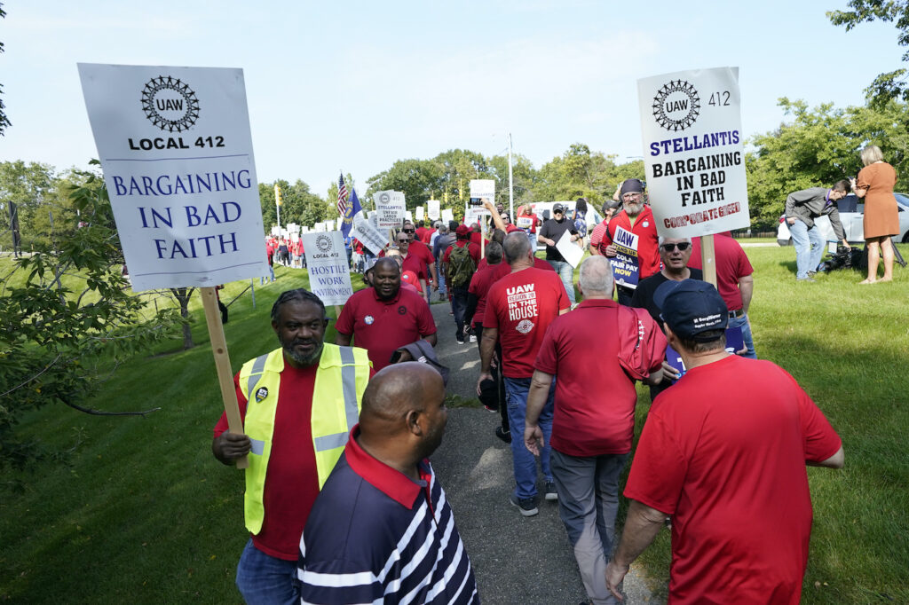 Auto Workers Strike UAW members striking