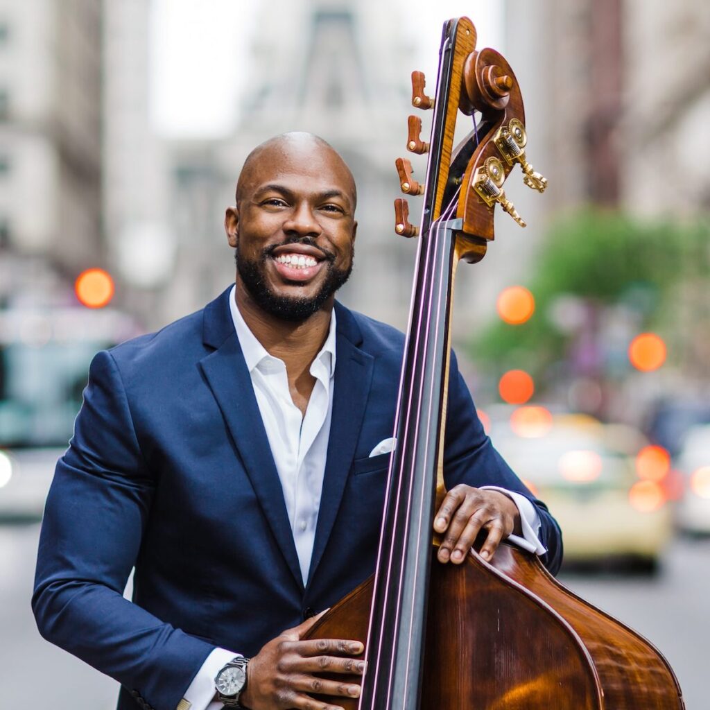 Conyers_Joseph_2023_May_NicoleRoche Joseph Conyers poses with a bass in front of Philadelphia City Hall.