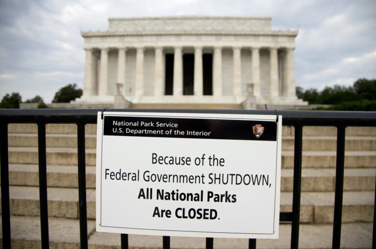 A sign saying 'All National Parks Are Closed'