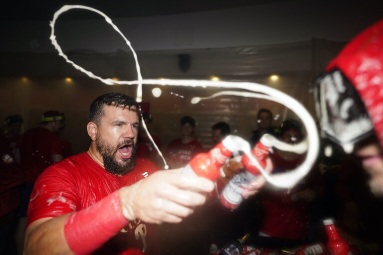 Kyle Schwarber celebrating in the locker room