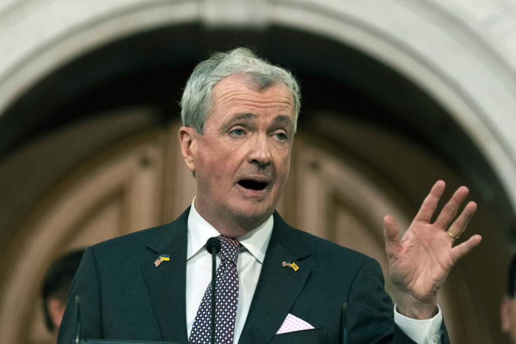 Phil Murphy speaking at a podium