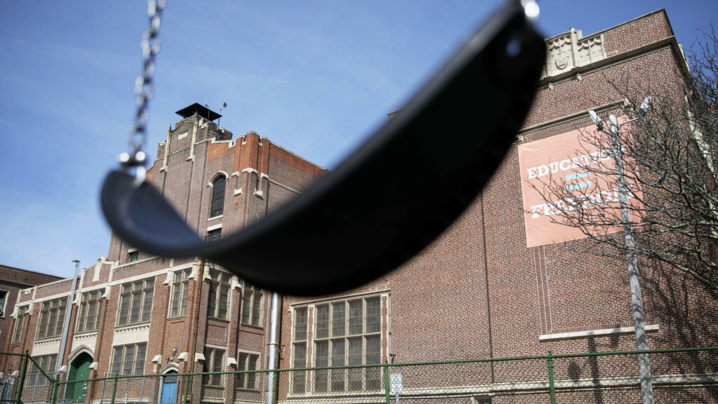 A swing sits empty on a playground outside in Providence, R.I. Experts say the ending of the expanded child tax credit was a key factor in the increase in child poverty. (David Goldman/AP)