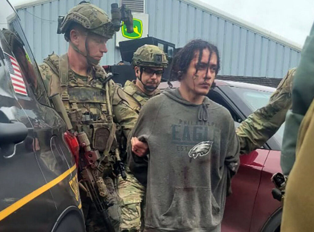 APTOPIX Prisoner Escape Pennsylvania Danelo Cavalcante in custody, flanked by officers