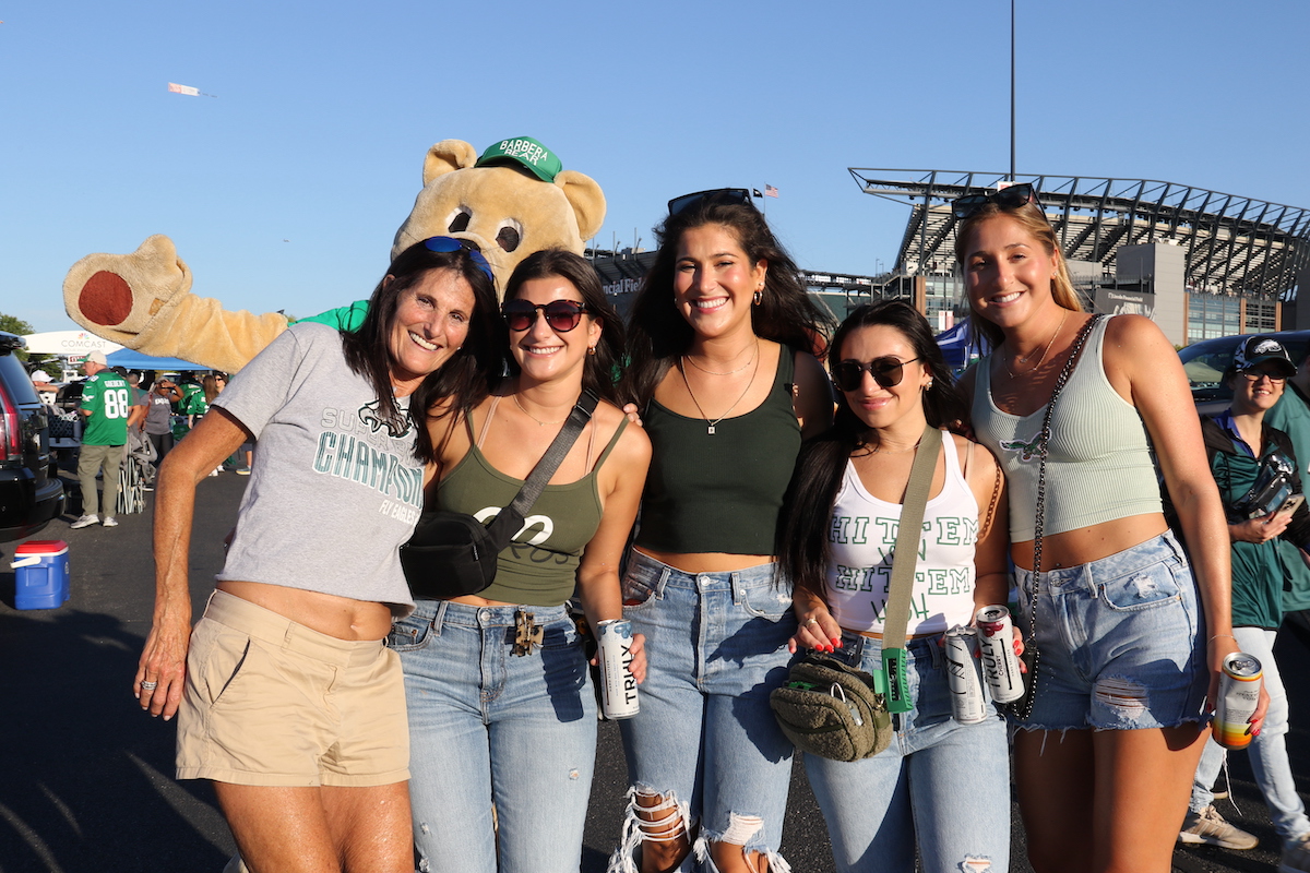 Eagles fans pose for a photo.