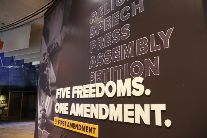 A large sign reads: 