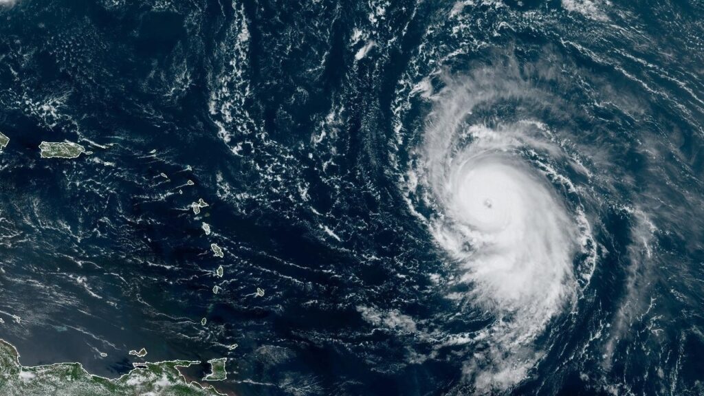 Hurricane Lee formed a well-defined eye wall on Thursday. The storm is seen here in a satellite image from around noon ET Thursday, showing the Leeward Islands and Puerto Rico to the west. Hurricane Lee formed a well-defined eye wall on Thursday. The storm is seen here in a satellite image from around noon ET Thursday, showing the Leeward Islands and Puerto Rico to the west