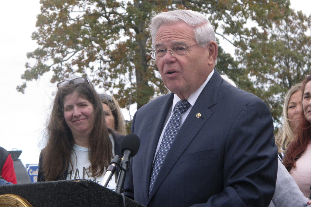 Robert Menendez Sen. Bob Menendez speaks at a podium.