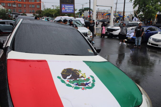 Cars decorated with the Mexican flag formed a parade through Philadelphia on Sept. 10, 2023, in celebration of Mexican Independence Day. (Emily Neil/WHYY)