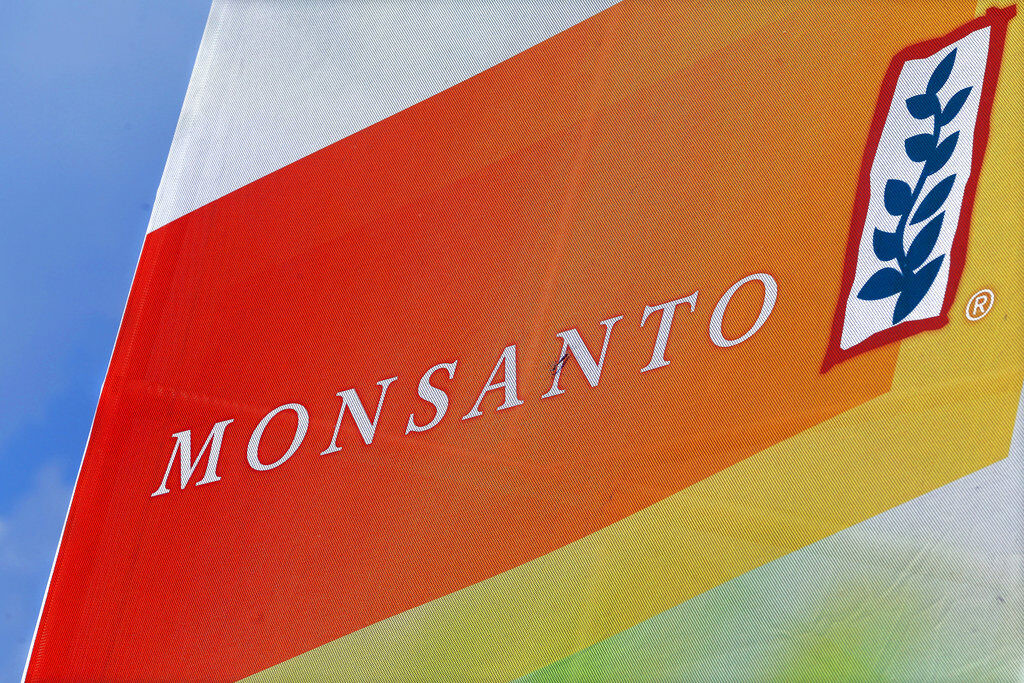 Earns Monsanto A sign reads Monsanto.