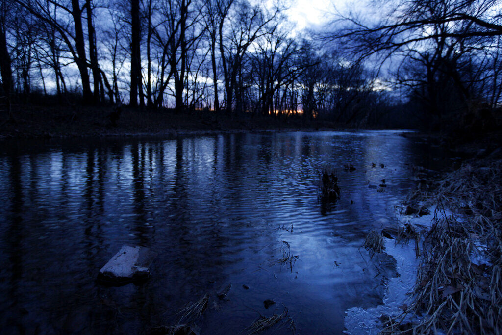 Gas Drilling Frackwater Neshaminy Creek at sunset