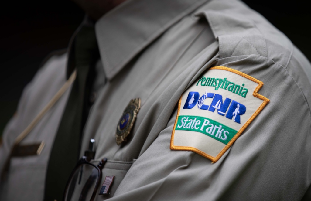 pennsylvania-state-parks-badge-commonwealth-media-services-2023-09-29 A Pennsylvania Department of Conservation and Natural Resources State Parks patch on a shirt