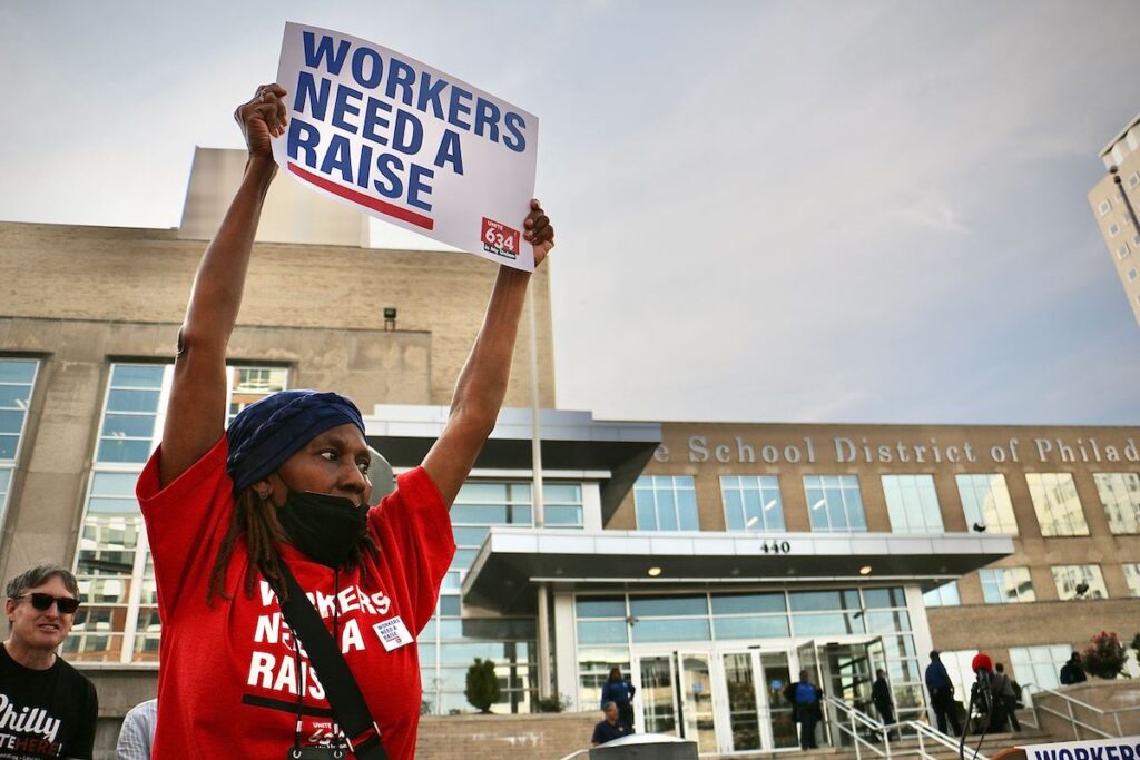 unite-here-rally-philly-schools-1 A union member holds up a sign that reads
