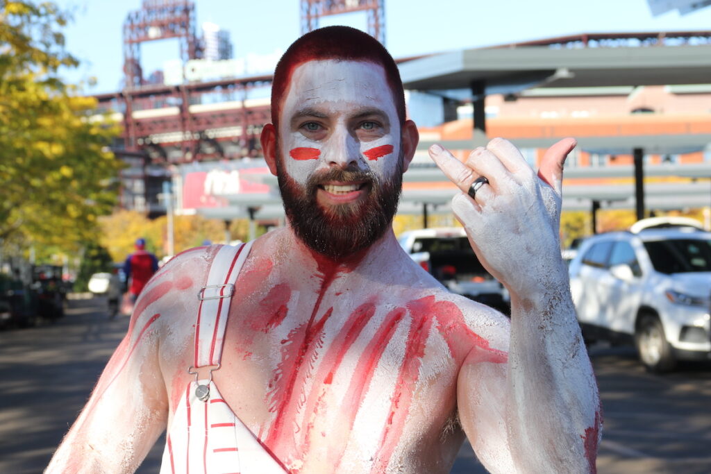 019A1969 Mike Grimm is a lifelong Phillies fan who says the atmosphere at Citizens Bank Park can't be matched. He dyed his hair red on Monday ahead of Game 6 of the National League Championship Series. (Cory Sharber/WHYY)
