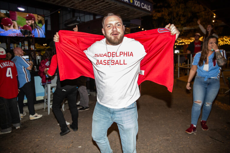 Fans celebrate as the Phillies clinch their spot in the NLCS, putting them one step closer to the World Series on October 12 2023 (Emily Cohen for WHYY)
