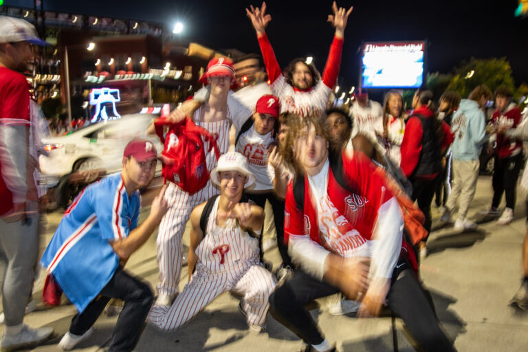 Fans celebrate as the Phillies clinch their spot in the NLCS, putting them one step closer to the World Series on October 12 2023 (Emily Cohen for WHYY)