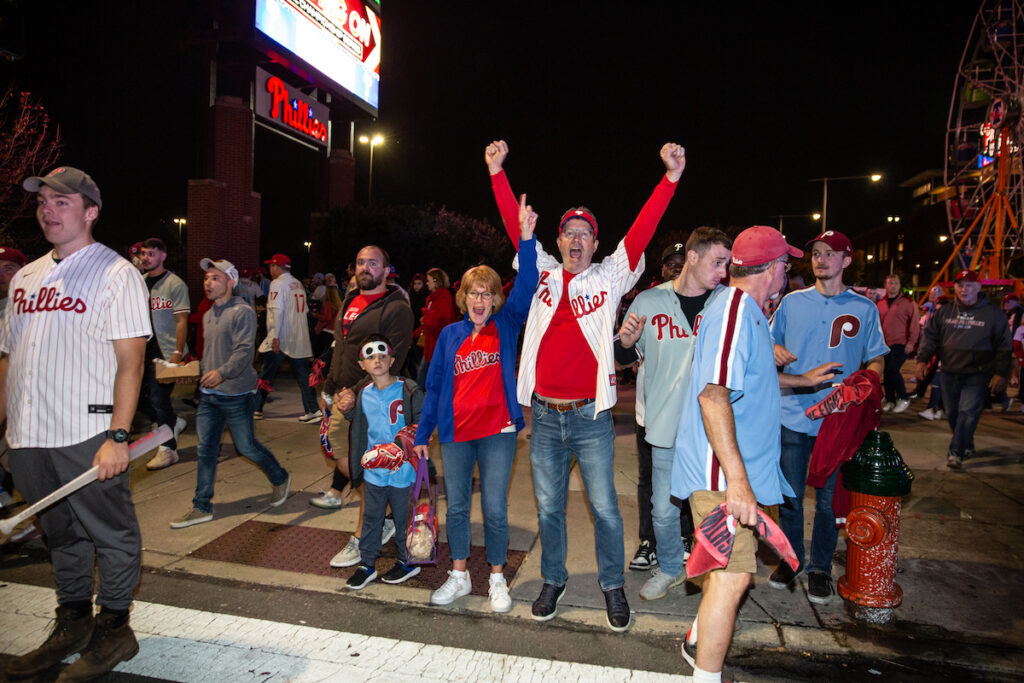 10122023-e cohen- phillies fans celebrate win- citzens bank park-0443 Fans celebrate as the Phillies clinch their spot in the NLCS, putting them one step closer to the World Series on October 12 2023 (Emily Cohen for WHYY)