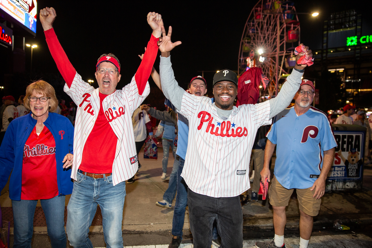 Fans celebrate as the Phillies clinch their spot in the NLCS