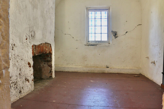 An empty cell with a window