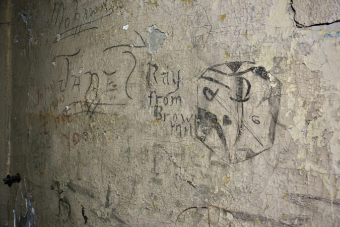 Drawings on the wall in a former cell