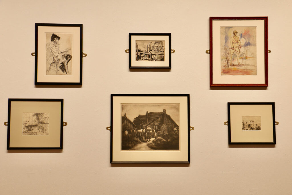 Dox Thrash prints displayed on a wall