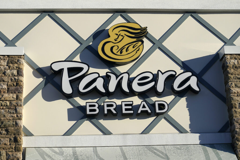 Panera Bread Earns A Panera Bread logo is attached to the outside of a Panera Bread restaurant location, Tuesday, Dec. 20, 2022, in Westwood, Mass. (AP Photo/Steven Senne)