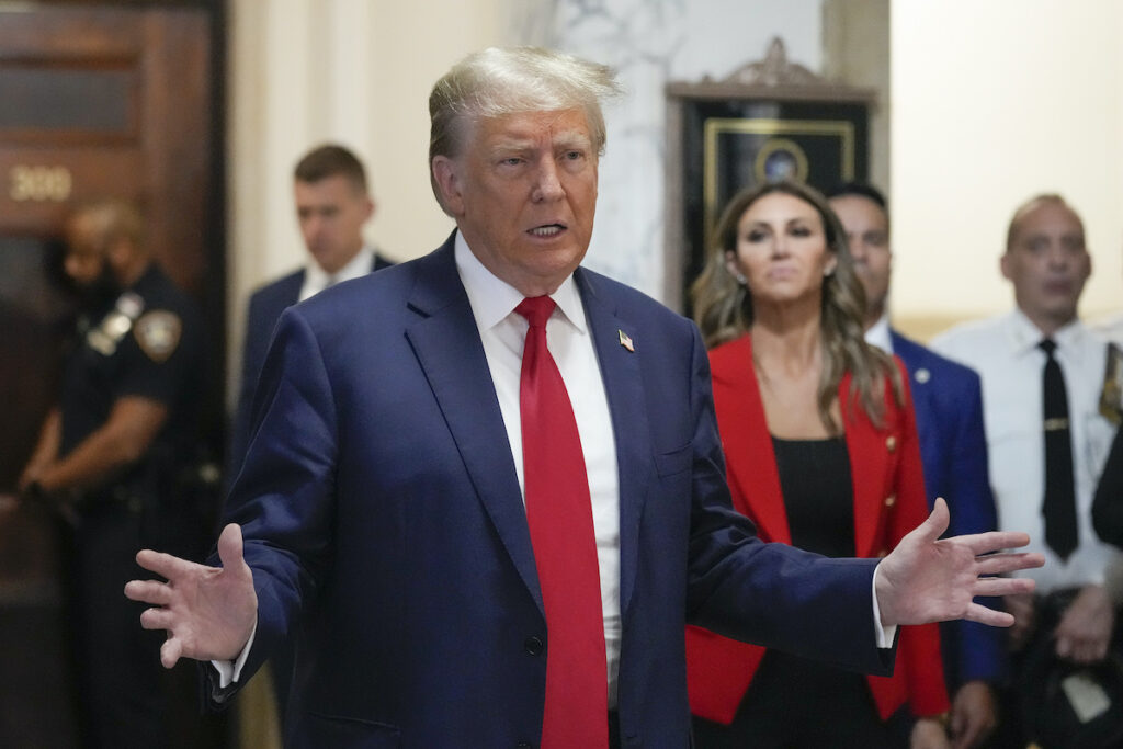 Trump Fraud Lawsuit Former President Donald Trump speaks to the media before entering the courtroom at New York Supreme Court, Tuesday, Oct. 3, 2023, in New York.