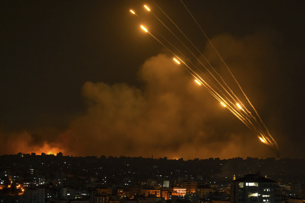 APTOPIX Israel Palestinians Rockets are fired toward Israel from the Gaza Strip, Sunday, Oct. 8, 2023