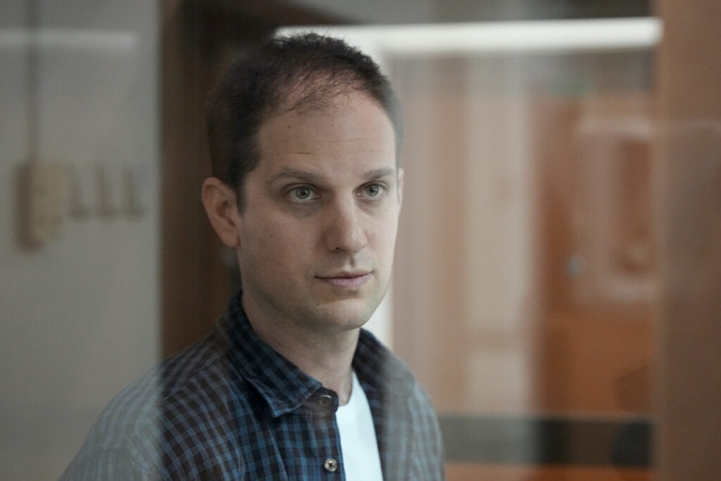 Russia US Journalist Wall Street Journal reporter Evan Gershkovich stands in a glass cage in a courtroom at the Moscow City Court in Moscow, Russia, Tuesday, Oct. 10, 2023.