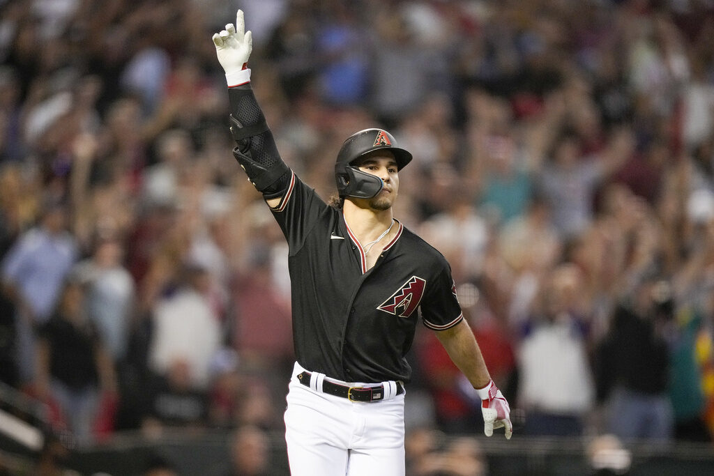 NLCS Phillies Diamondbacks Baseball Arizona Diamondbacks' Alek Thomas raises his hand up after hitting a home run