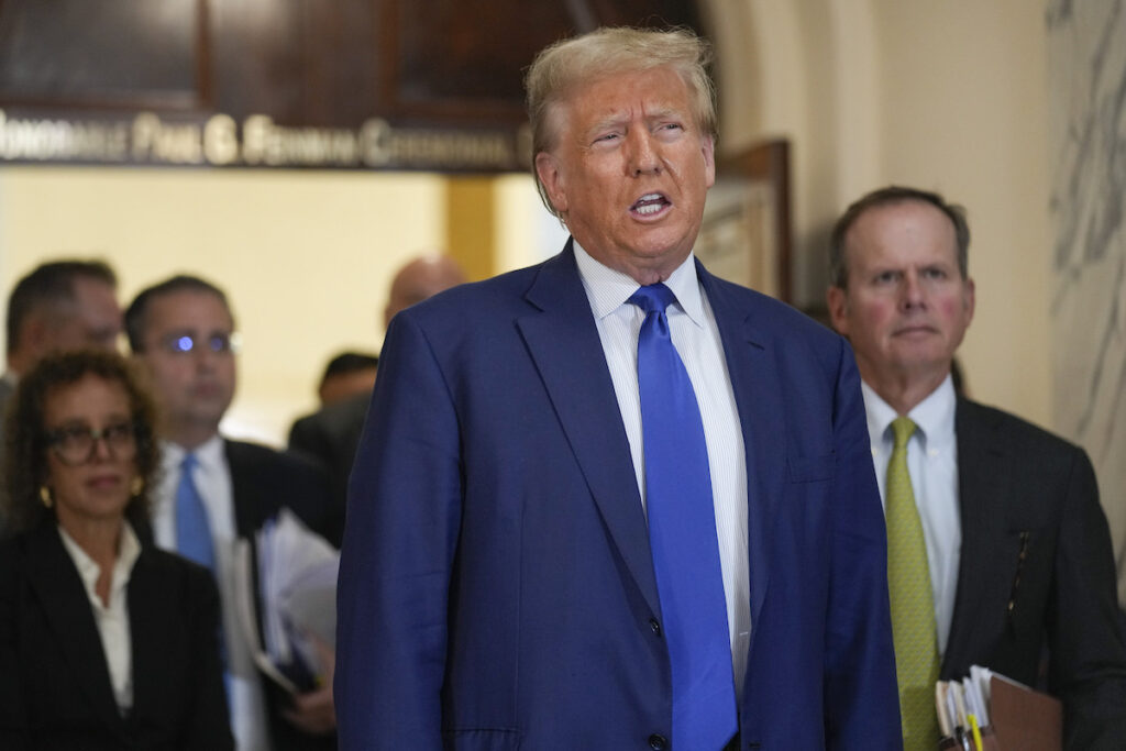 Trump Fraud Lawsuit Former President Donald Trump speaks during a break in his civil business fraud trial at New York Supreme Court, Wednesday, Oct. 25, 2023, in New York