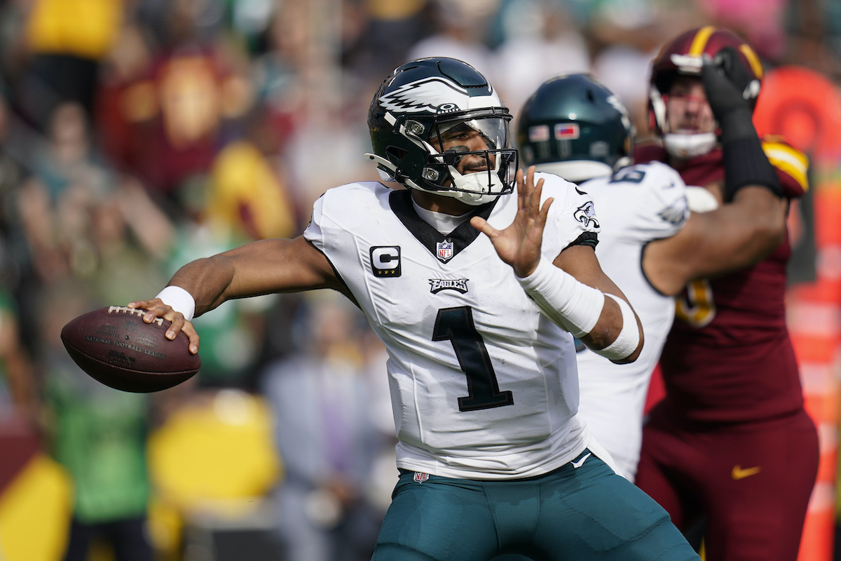 Jalen Hurts Philadelphia Eagles quarterback Jalen Hurts (1) throwing the ball during the first half of an NFL football game against the Washington Commanders, Sunday, Oct. 29, 2023, in Landover, Md. (AP Photo/Stephanie Scarbrough)