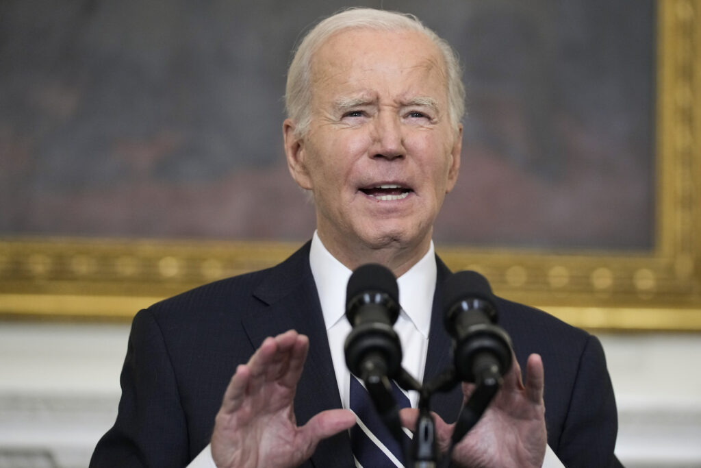 Joe Biden Joe Biden speaking into a microphone