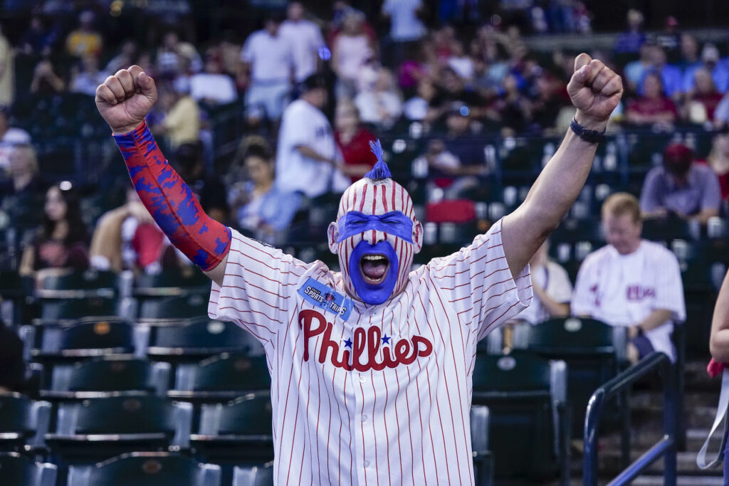 NLCS Phillies Diamondbacks Baseball A Phillies fan with face painted cheering in the stands.