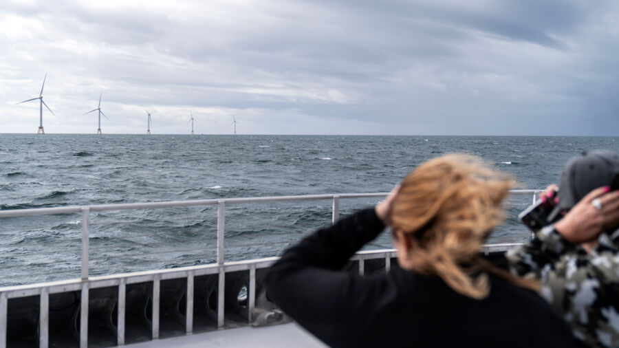 Orsted-offshore-wind-farm-turbines-900×506 Guests tour the five turbines of America's first offshore wind farm, owned by the Danish company, Ørsted, off the coast of Block Island, R.I. Ørsted is being sued over its Ocean Wind 1 project, New Jersey’s first offshore wind farm.