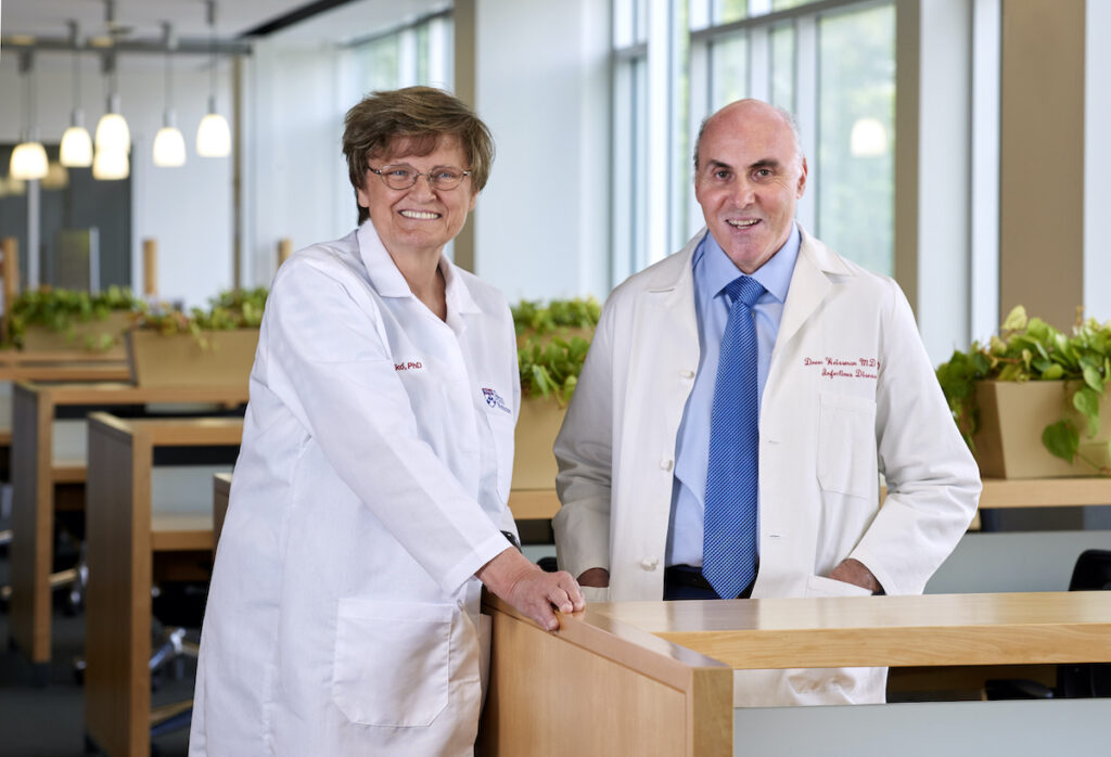 Weissman and Kariko 1_Peggy Peterson Photography, courtesy Penn Medicine Closeup of Penn Medicine researchers Katalin Karikó Ph.D. and Dr. Drew Weisman Ph.D. in a Penn Medicine lab. (Peggy Peterson Photography courtesy Penn Medicine)