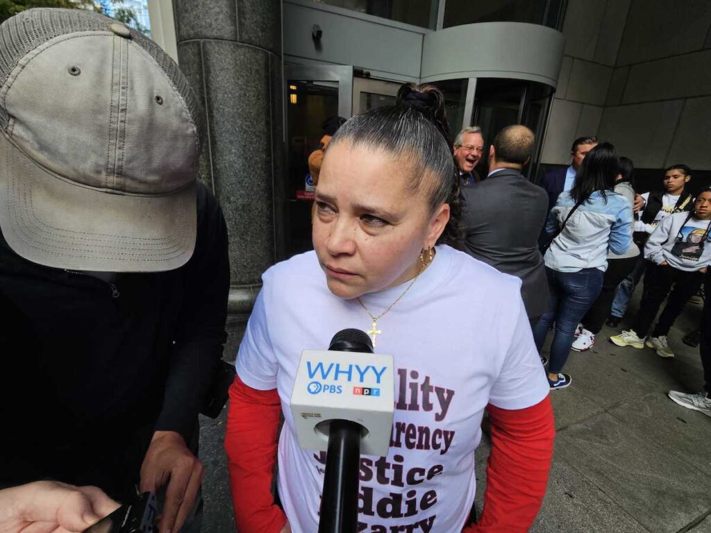 Eddie Irizarry's aunt Ana Cintron talking to reporters