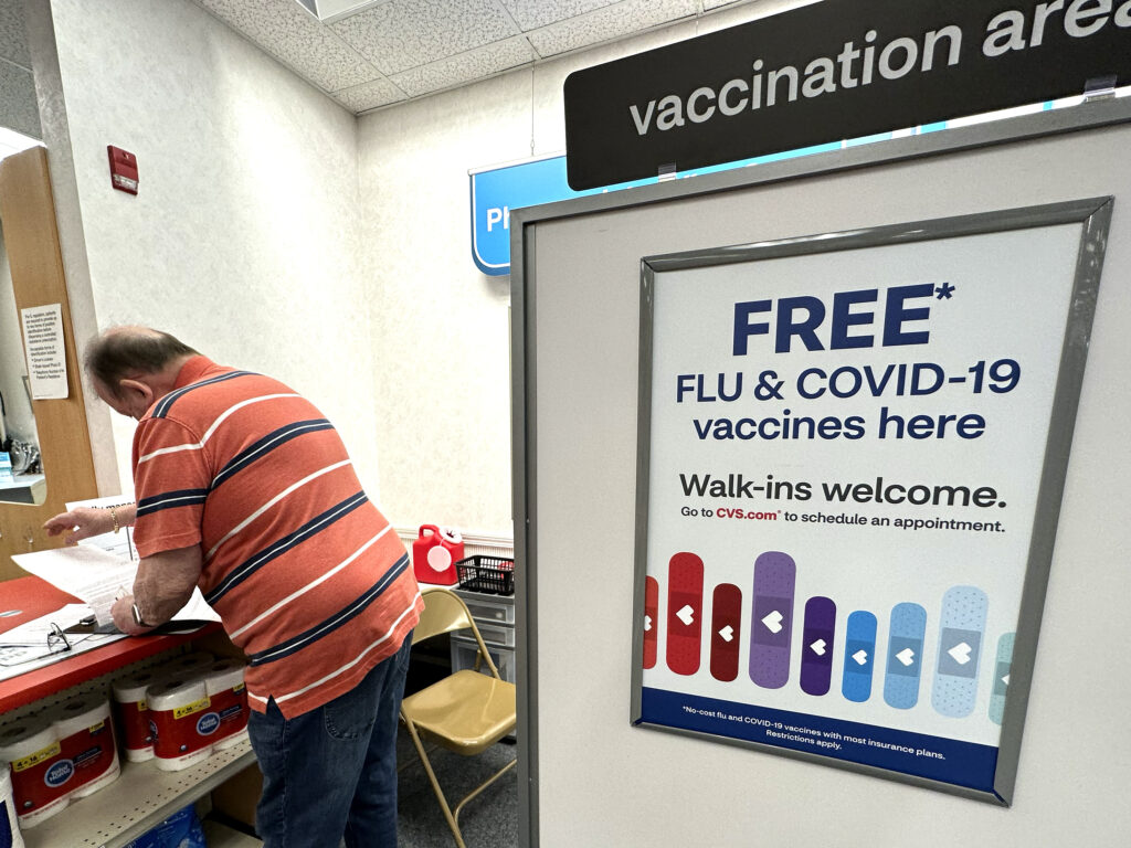 Flu and COVID-19 vaccinations are now available across the U.S., including at this CVS pharmacy in Palatine, Illinois. Flu and COVID-19 vaccinations are now available across the U.S., including at this CVS pharmacy in Palatine, Illinois.