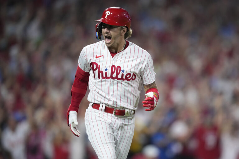 Philadelphia Phillies' Bryson Stott reacts after hitting a grand slam