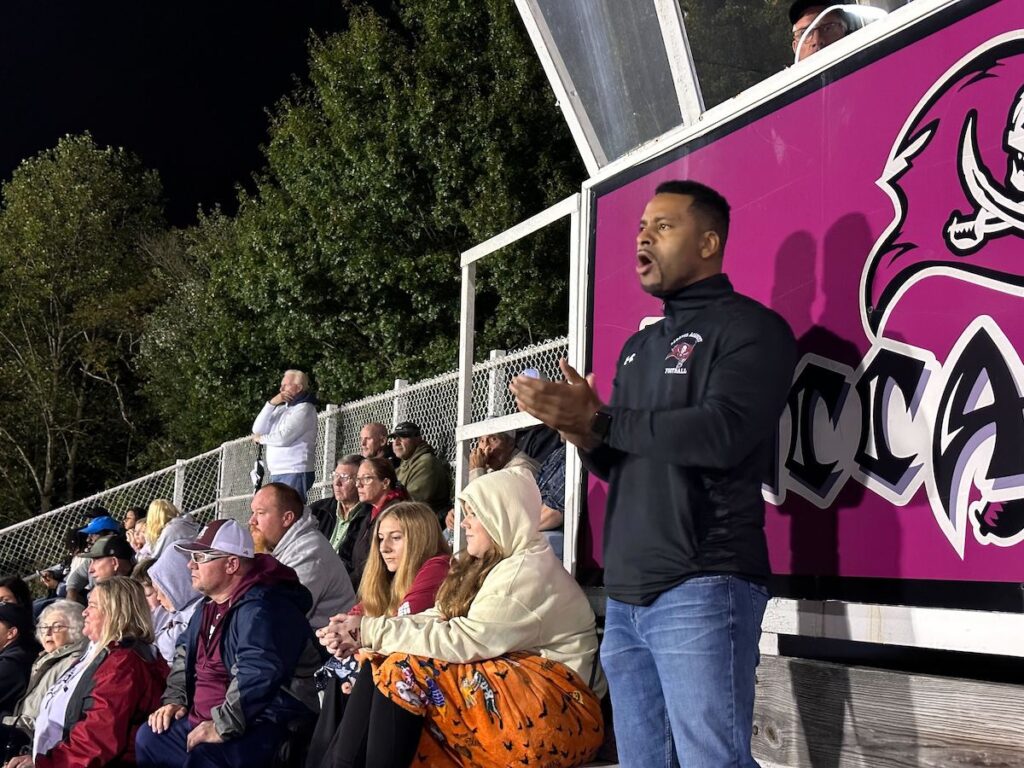 Family members cheer on Jordan Miller