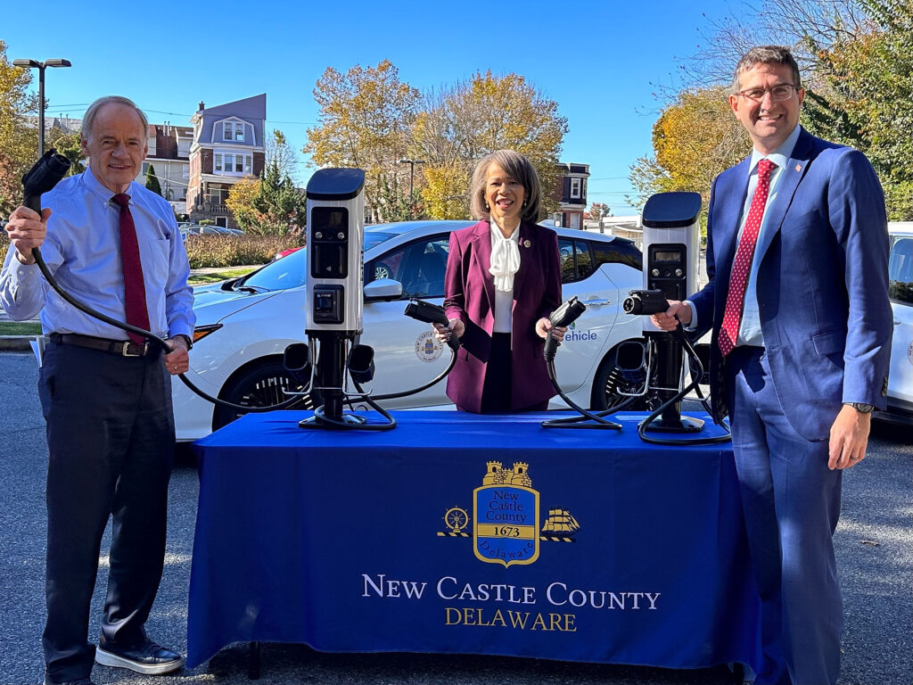 ev-new-castle-county-j-perez-gonzalez-2023-10-23-2 Tom Carper, Lisa Blunt Rochester, and Matt Maher with the new EV plugs.