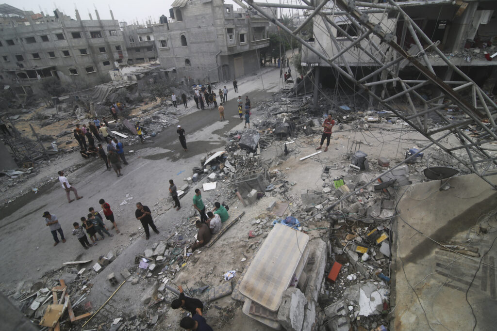 Israel Palestinians Palestinians look for survivors after the Israeli bombardment of the Gaza Strip in Rafah