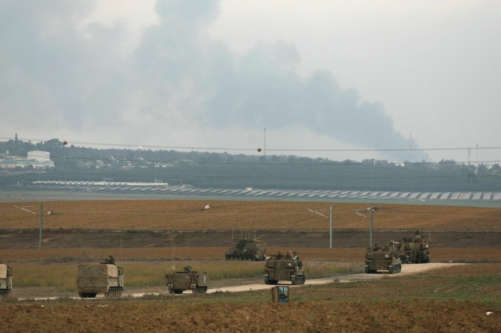 ISRAEL-PALESTINIAN-CONFLICT Israeli troop reinforcements take position at the border with Gaza in southern Israel on October 9, 2023. Social media and messaging apps have been flooded with false and out of context images since fighting started this weekend