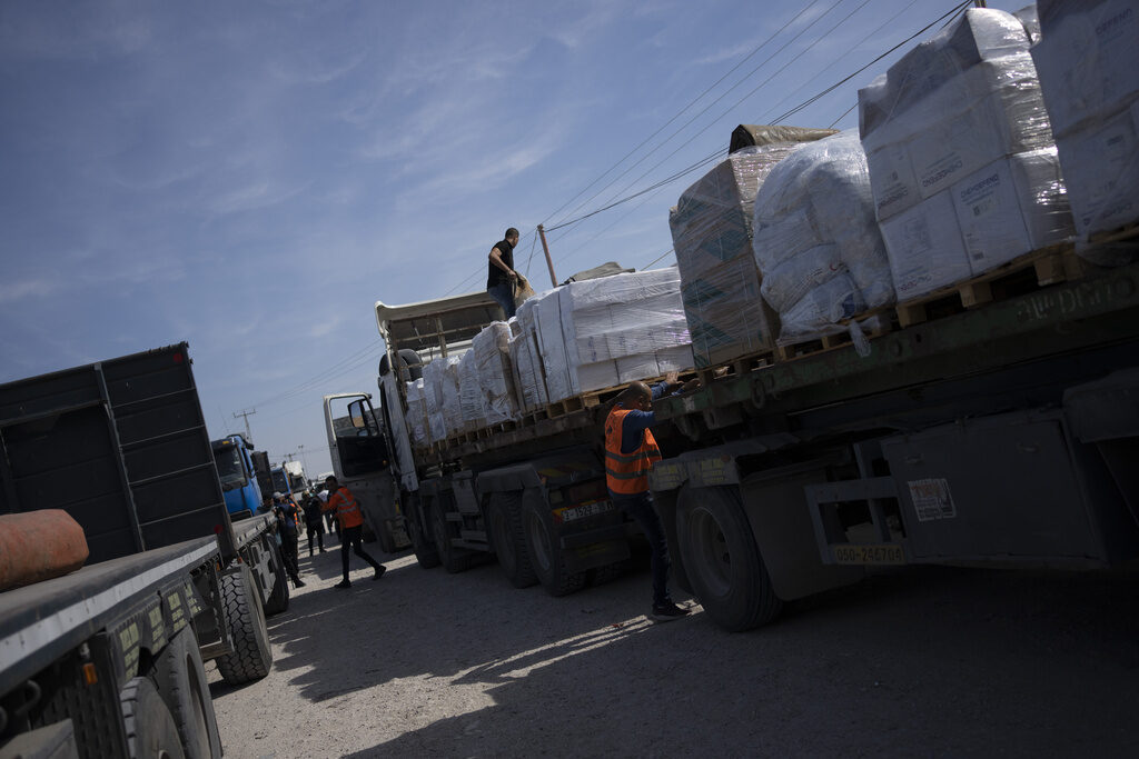 Israel Palestinians Aid trucks lined up to enter Gaza