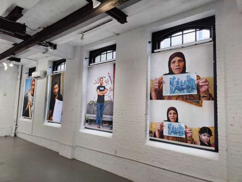 Photos of Palestinians displayed on a wall