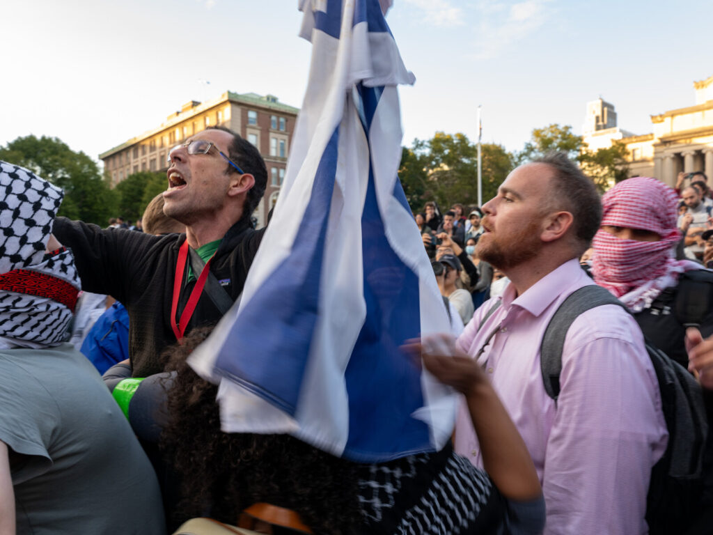 Student Palestinian Group Holds Rally At Columbia University Protesters waving an Israeli flag