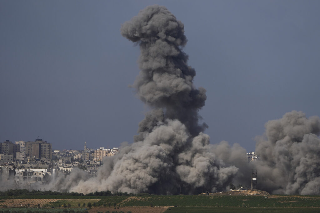 APTOPIX Israel Palestinians Smoke rises following an Israeli airstrike in the Gaza Strip